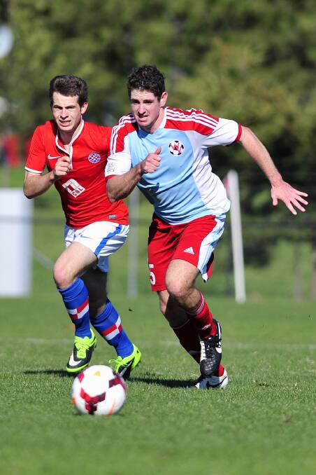John Gibson, right, was on target for Woden. Photo: Jeffrey Chan
