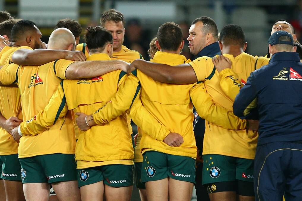 United: Wallabies coach Michael Cheika and his players. Photo: Getty Images