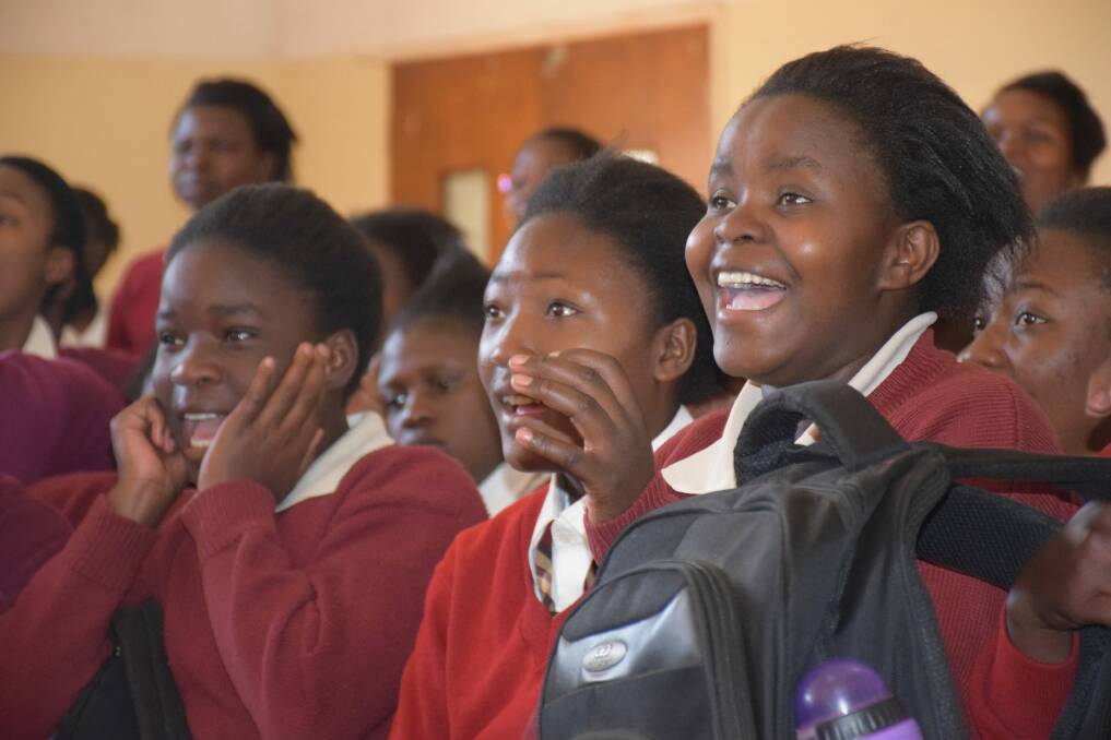 Students react to a science demonstration from Science Circus Africa. Photo: Graham Walker