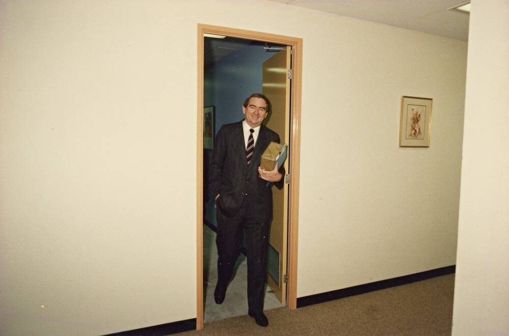 Queensland premier Mike Ahern exiting a room during World Expo 88 in South Bank.  Photo: John Oxley Library, State Library of Queensland