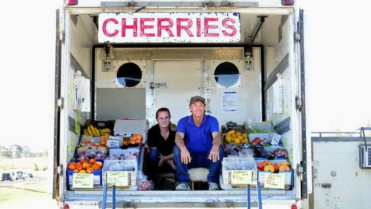 NEWS: Paul Neilson and wife Kerrie travel to Canberra from Cowra to sell fruit from their truck on Horse Park Drive. Photo: Melissa Adams