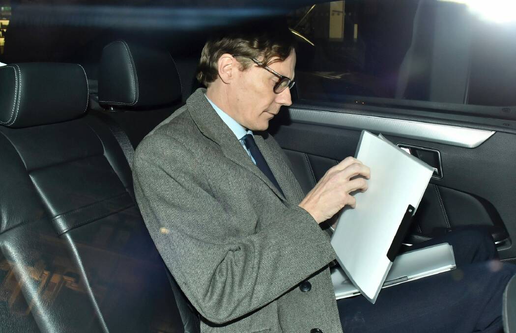 Suspended chief executive of Cambridge Analytica Alexander Nix leaves the offices in central London on Tuesday, March 20. Photo: Dominic Lipinski