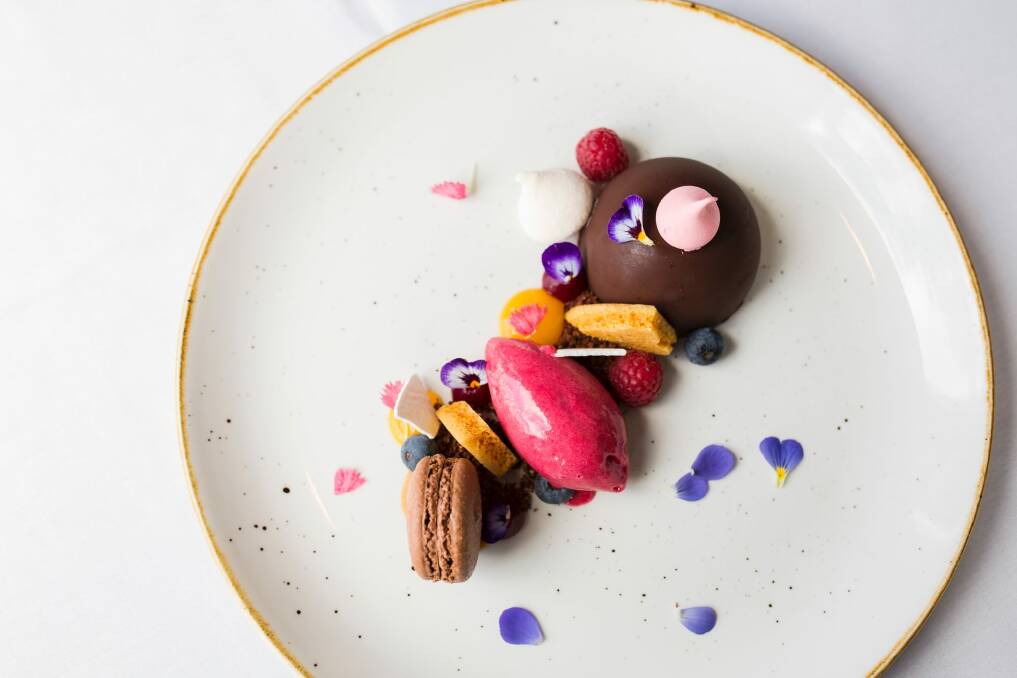 Chilled chocolate fondant with pomegranate and raspberry sorbet.  Photo: Jamila Toderas