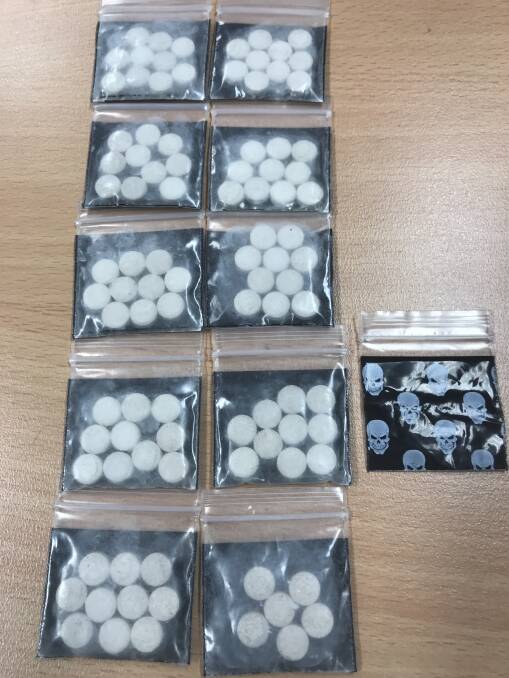 Suspected MDMA tablets allegedly found by police during a search in Petrie Plaza. Photo: ACT Policing