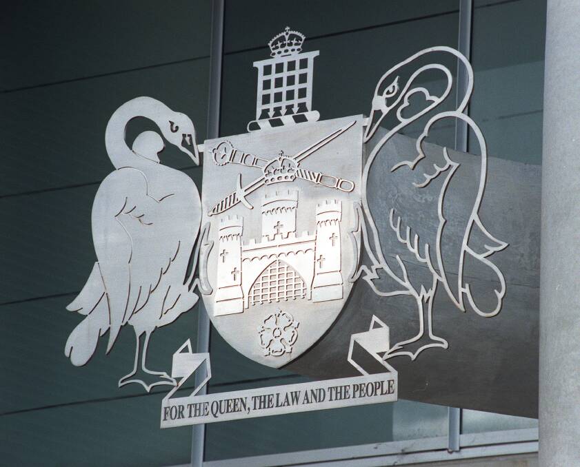 The coat of arms of the City of Canberra, at the ACT Magistrates Court. Photo: Gary Schafer