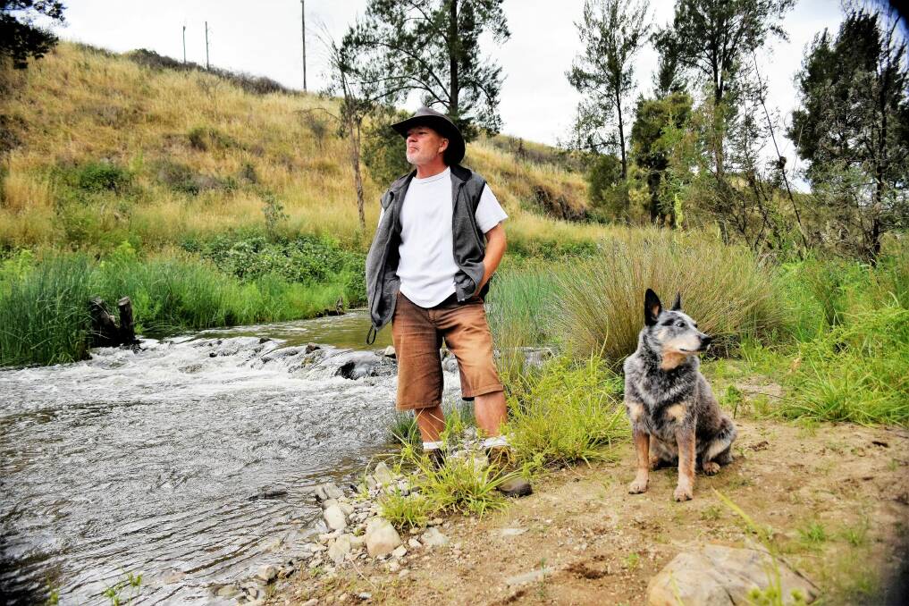 Oaks Estate unit dwellers, Karl Steiner, 50, and his dog, Sheba, 6, walk Oaks Estate river corridor heritage trail every day. Mr Steiner said it made a massive contribution to his quality of life. "It's a big reason why I stay here," he said. Picture David Ellery. Photo: David Ellery