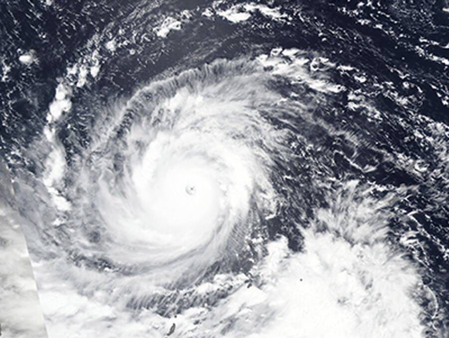 Typhoon Mangkhut churns west towards the Philippines. Photo: NASA/AP