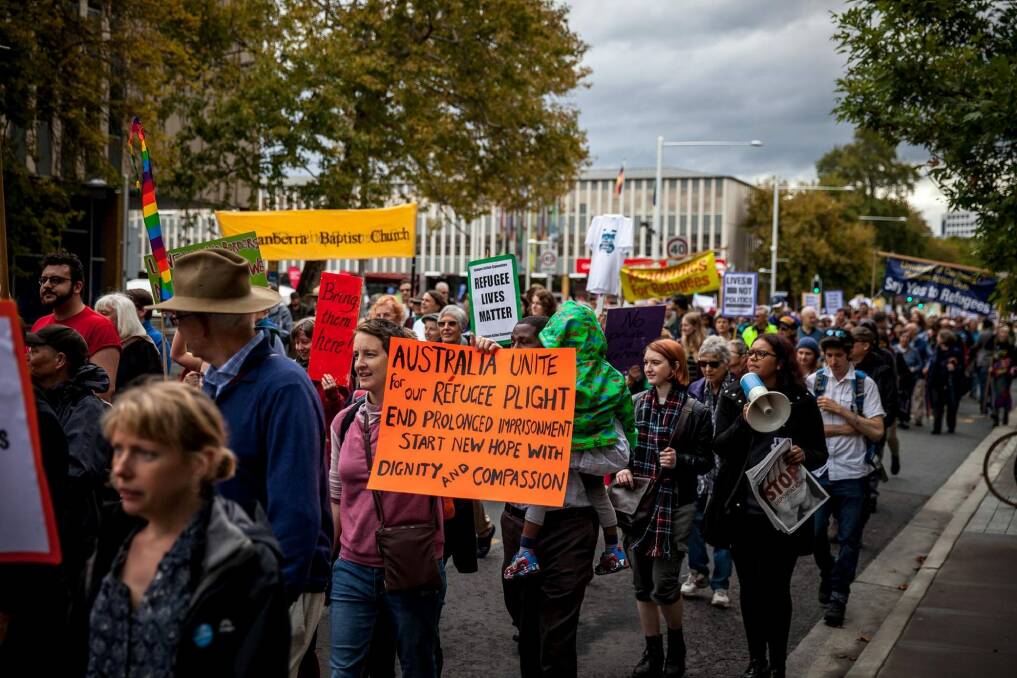 Protesters at the rally organised by the Canberra Refugee Action Committee. Photo: Ricky Robinson