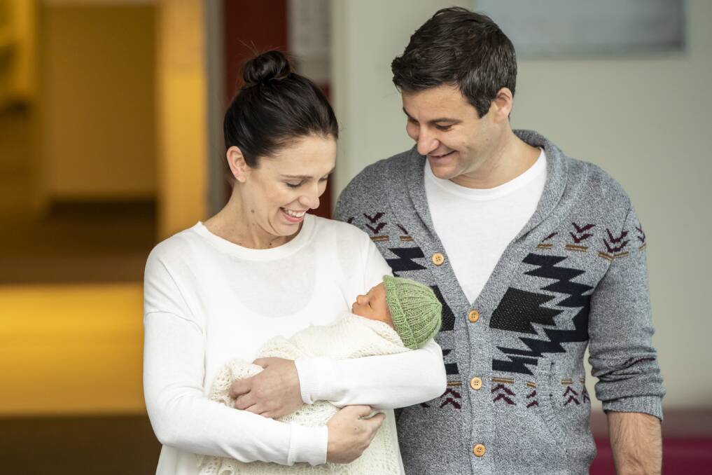 New Zealand Prime Minister Jacinda Ardern and her partner Clarke Gayford leave hospital with their new baby daughter in Auckland. Photo: AAP