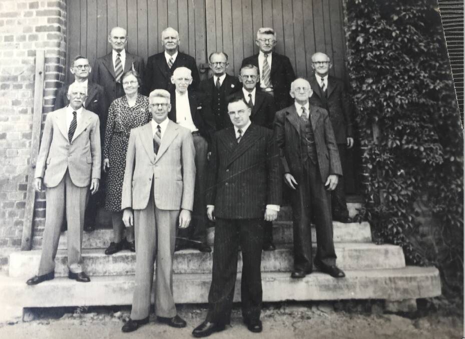 Morris Boot Factory managers outside the Paddington Factory in 1941, with David Loosemore’s grandfather Douglas Loosemore (left) and great uncle James Stephens (front right). Photo: David Loosemore