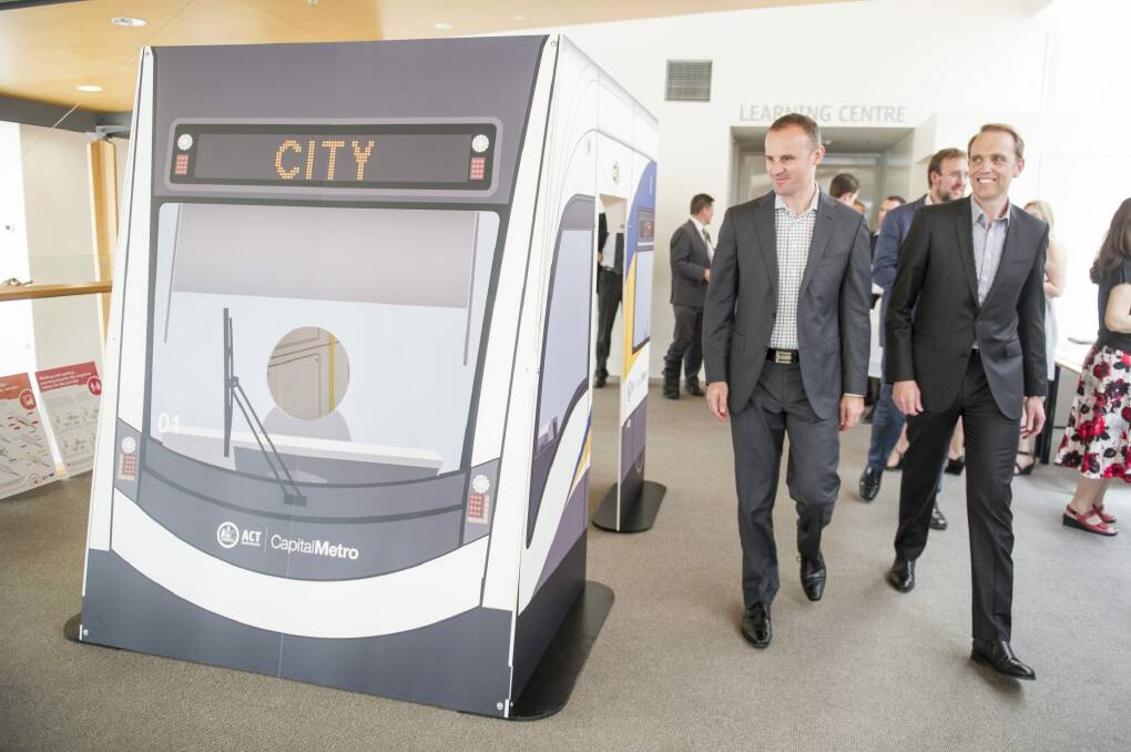 ACT Chief Minister Andrew Barr and Capital Metro Minister Simon Corbell check out a cardboard mock-up of the light rail tram in January.  Photo: Jay Cronan