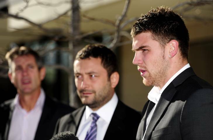 Canberra Raider Josh Dugan (right) speaks to the media outside Canberra Magistrates Court, with his solicitor Kamy Saeedi (centre) and Raiders CEO Don Furner. Photo: Stuart Walmsley