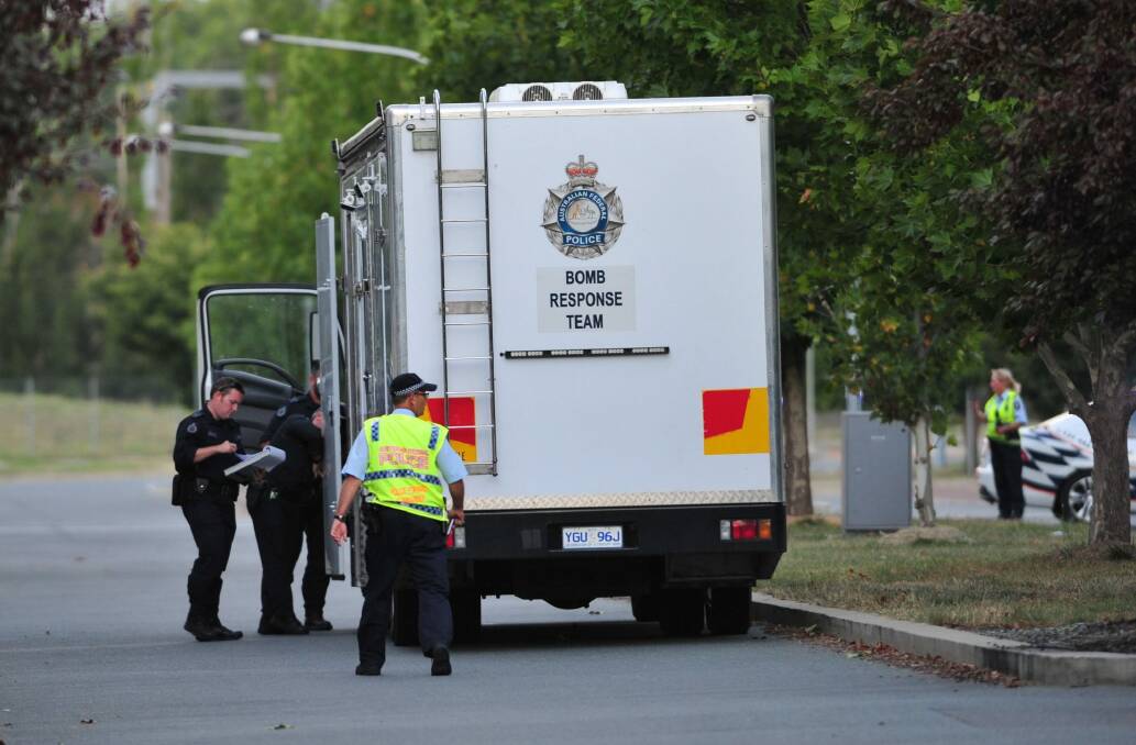 ACT Policing's bomb response team on the scene. Photo: Melissa Adams 