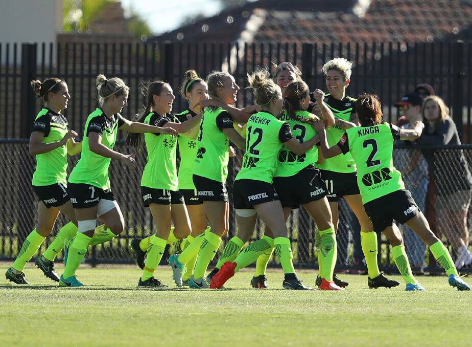 Jenna McCormick of Canberra United celebrates after scoring a goal. Photo: Getty Images