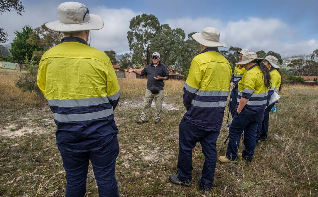 The ACT's first Aboriginal Green Army have begun work across the capital doing land management and cultural learning with Ngunawal elders such as Wally Bell. (centre) ?Photo by Karleen Minney. Photo: karleen minney