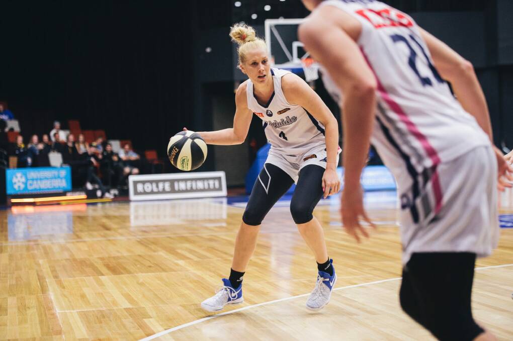 Adelaide's Abby Bishop takes on her former team. Photo: Rohan Thomson