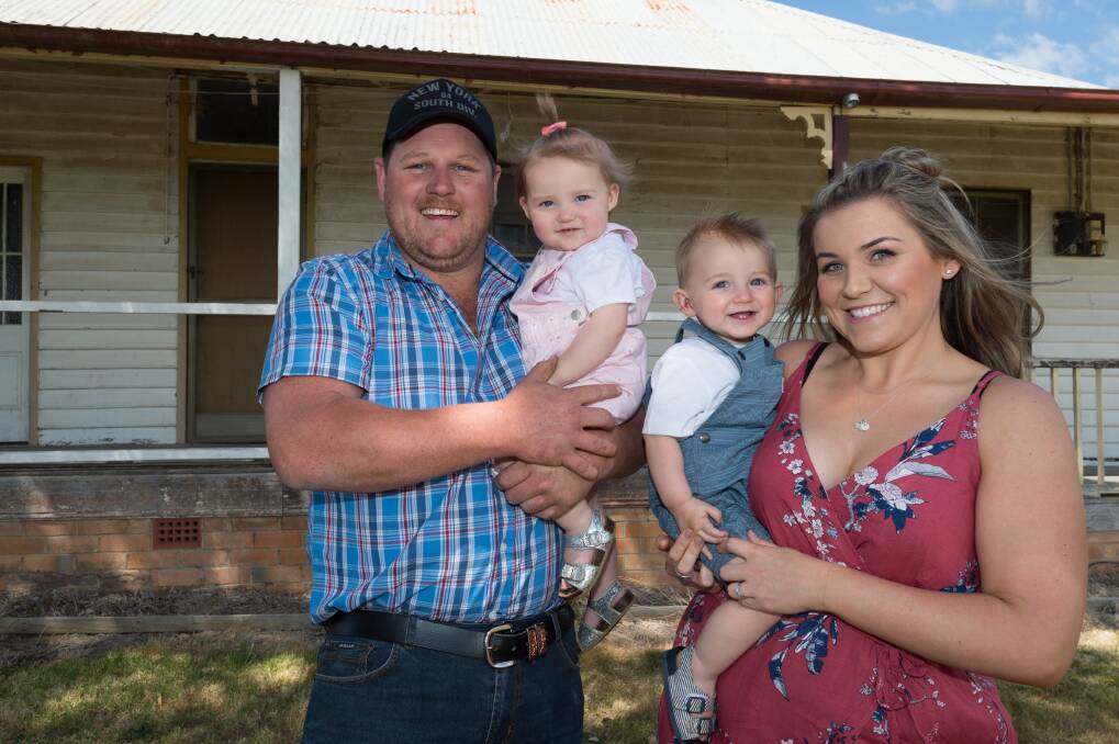 Toad and Mandy with their twins Layla and Lenny at home in the Bega Valley Shire. Photo: Supplied
