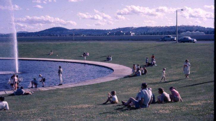 Summer: Marilyn and Bill Gillard's entry to The Canberra Times' "Lake Memories" photo competition. Both remember the Rond Pond as a very popular picnic and paddling place. Photo: Marilyn and Bill Gillard