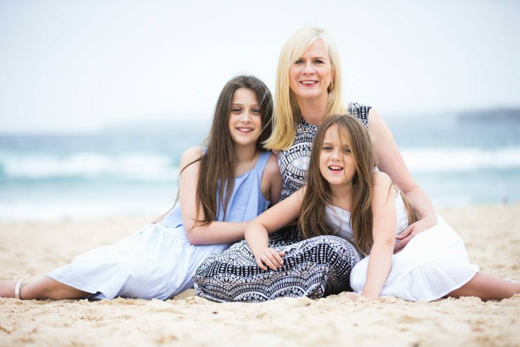 Collector mum Barbara Bryan with daughters Brooke, 11, and Samantha, 9, on a recent trip to Bondi. Barbara reviews family travel online in her blog Let's Go Mum. Photo: Marcus Walters
