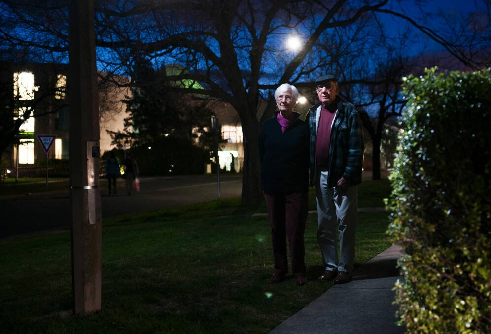 Margaret and David Simmonds, of Forrest, are concerned how dark Canberra streets are, with uneven paths also common.  Photo: Elesa Kurtz