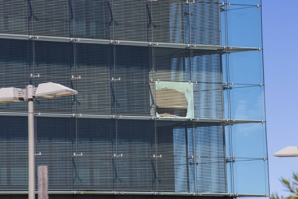 Another broken window at the ASIO headquarters in Canberra. Photo: Jamila Toderas