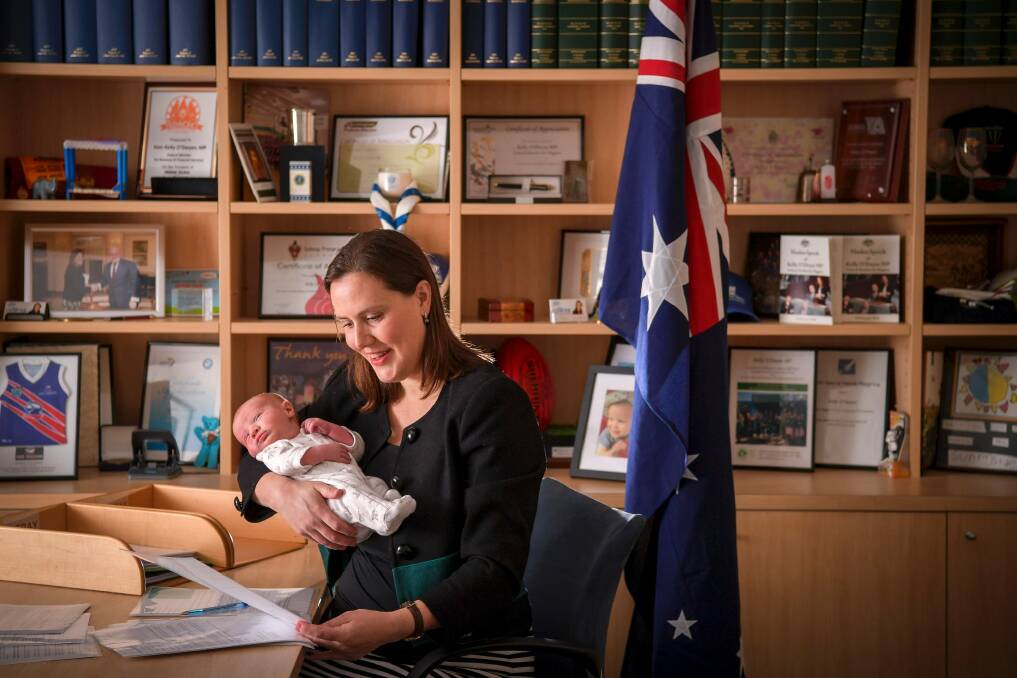Kelly O'Dwyer in her office with her newborn son. Photo: Eddie Jim