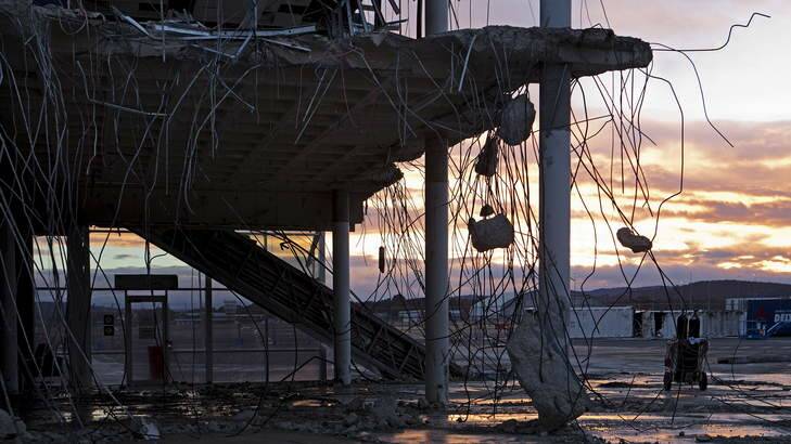Demolition of the old Ansett/Virgin terminal at Canberra Airport. Photo: Ginette Snow