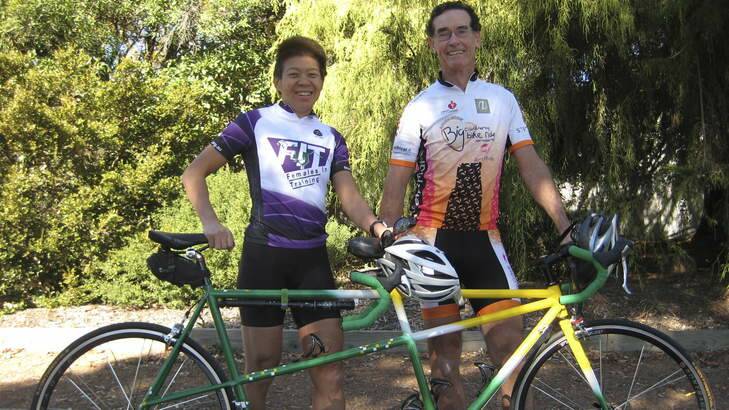 Blind cyclist Lindy Hou with her riding partner Elton Ivers, who steers and applies the brakes of their tandem bike. Photo: Supplied