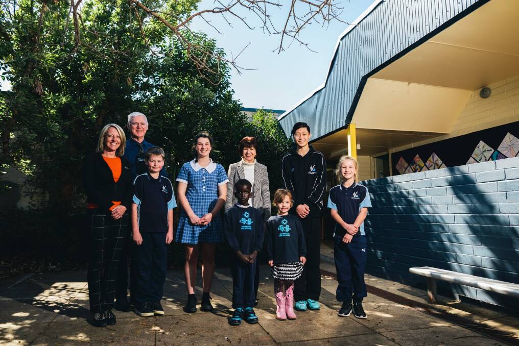 Wanniassa School is celebrating its 40th birthday and looking ahead to a bright future.
 (L-R) Senior School principal Cherie Connors, School principal Shane Gorman, Year 6  student Sam Crowther, Year 10 student Tarin Scarlett, junior school principal Elizabeth Courtois, pre-schoolers Deng Kuol and Shayla Lloyd, Year 6  student Minh Ngo and Year 6 student Taylah Perrett. Photo: Rohan Thomson