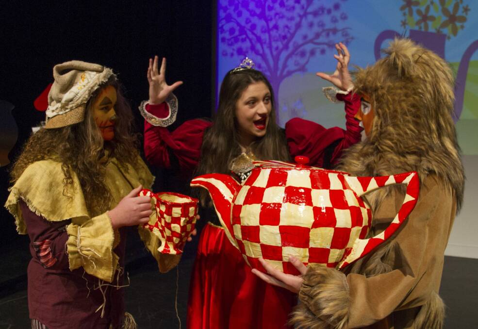 The Scarecrow (Charlotte Gee), the Queen of Hearts (Shaylah McClymont) and the Lion (Karissa Nicholson) share the spotlight in Dorothy In Wonderland. Photo: Alison Cooke