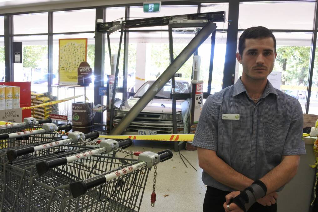 Woolworths worker Peter Fisher said customers had to jump out of the way when a car smashed into the front doors of the Charnwood store on Wednesday. Photo: Clare Sibthorpe