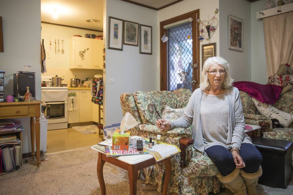 Trish Casey inside her Belconnen public housing unit. She has had repeated issues with maintenance over the years.  Photo: Sitthixay Ditthavong