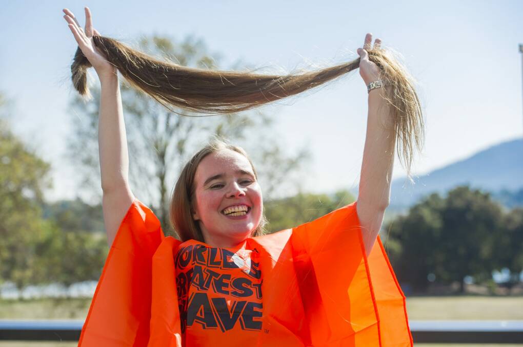 Nicolette Suttor had her 1.4 metre-long hair shaved off for the  Leukaemia Foundation's 2015 World's Greatest Shave at the National Library of Australia. Photo: Jay Cronan