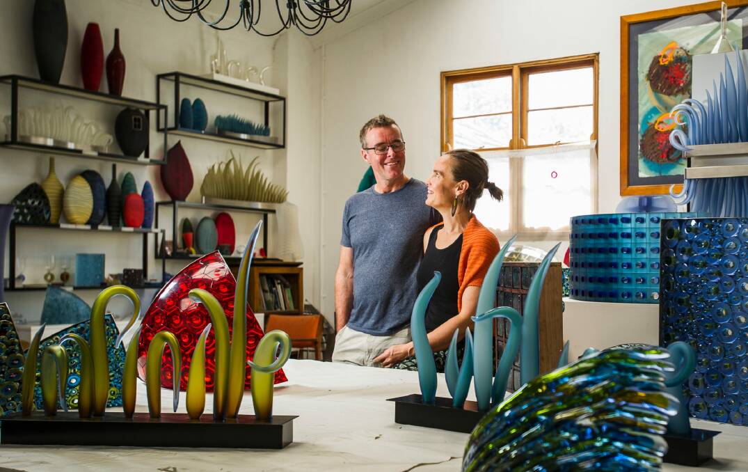 Glass artists husband and wife team, Matt Curtis and Harriet Schwarzrock, in their studio in Queanbeyan. Photo: Elesa Kurtz