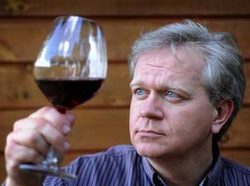 Brian Schmidt, savors a glass of wine. Photo: Marina Neil