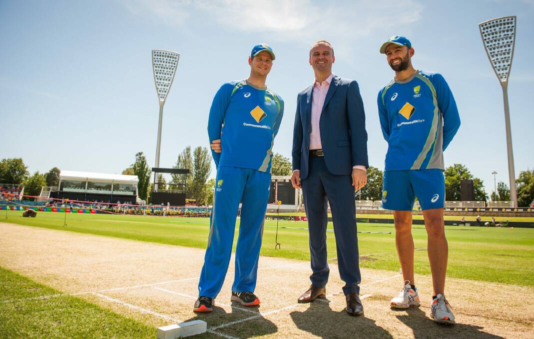 Andrew Barr with Steve Smith and Nathan Lyon before a one-day international in Canberra. Photo: Elesa Kurtz