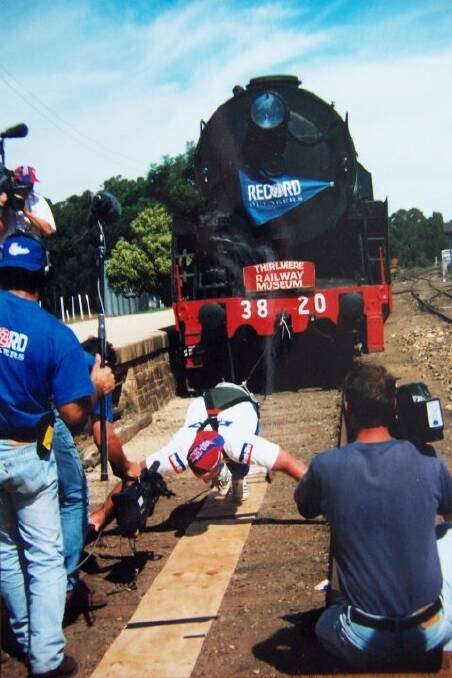 Commander Edwards's feats of strength  have been featured in the Guinness Book of Records. In 1996 he single-handedly pulled a 201-tonne steam locomotive 36.8m along a railroad track. Photo: Supplied