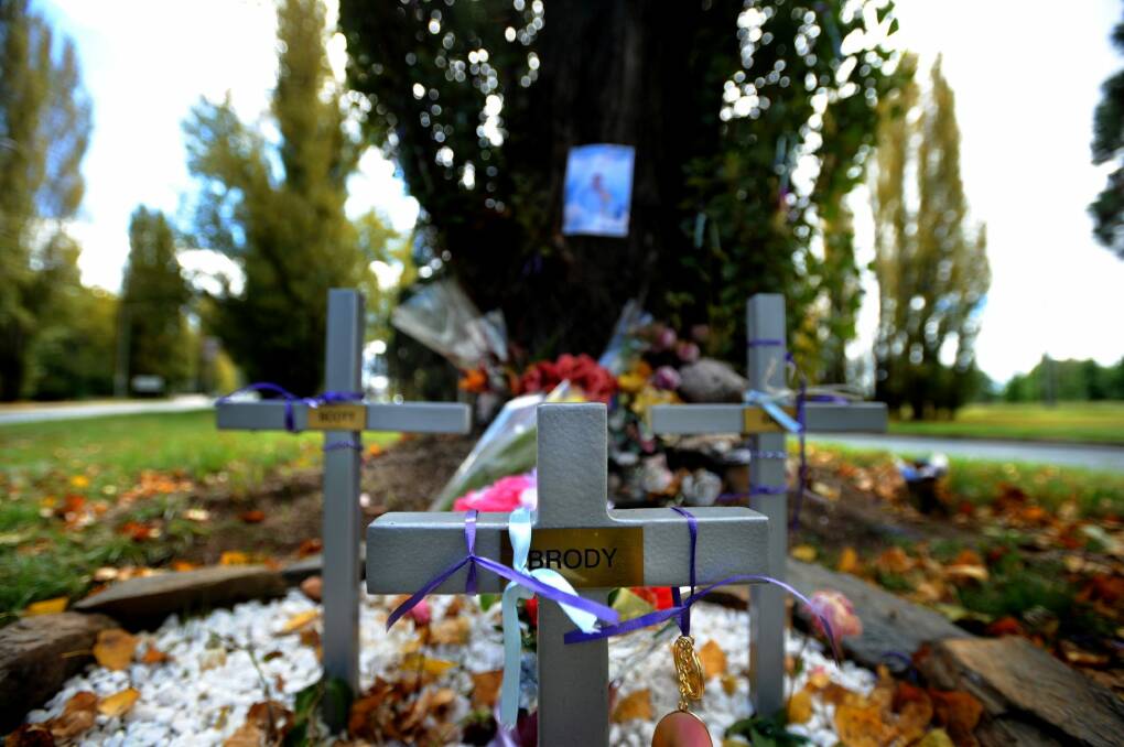 A memorial on Canberra Avenue, for Scott Oppelaar, Samantha Ford and their four-month old baby Brody Oppelaar who died in a horrific car crash on Canberra Avenue. Photo: Marina Neil MNZ