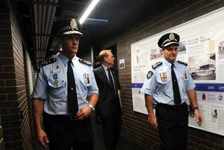 ACT Chief Police Officer, Roman Quaedvlieg, left, ACT Police Minister, Simon Corbell and AFP Commsissioner Tony Negus touring the Belconnen Police Station.
