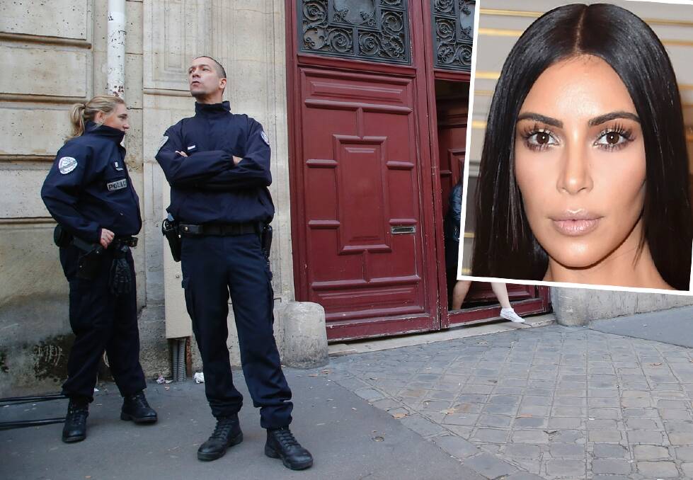 French police officers stand outside the residence of Kim Kardashian West in Paris. Photo: AP