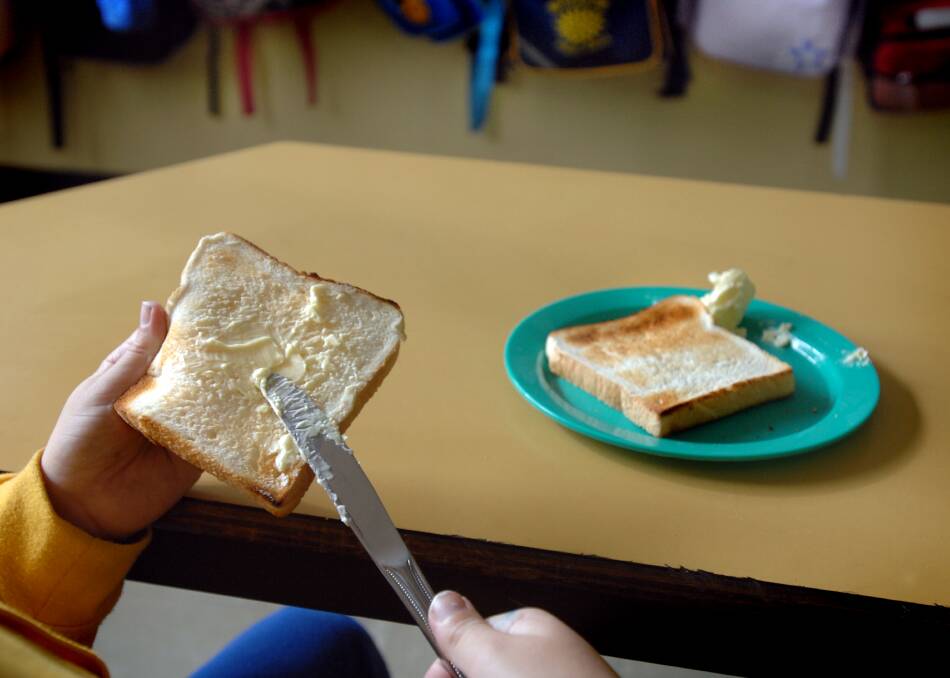 About a dozen breakfast clubs operate in schools across Canberra and Queanbeyan, feeding more than 500 children. Photo: Fairfax Media