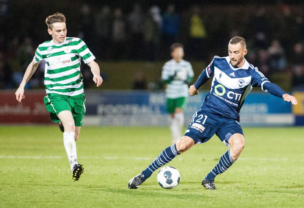 Belconnen United wants a playoff for Canberra's FFA Cup spot, which this year went to Tuggeranong United, pictured playing Melbourne Victory. Photo: Matt Bedford