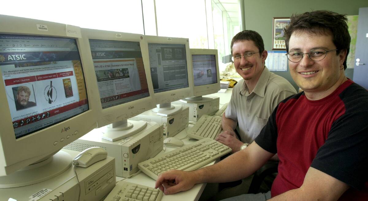 As ATSIC's web manager, Bullock (right) introduced live streaming to Canberra when he streamed the PM XI v ATSIC cricket match online in 2002. Bullock is pictured with then ATSIC multimedia developer Leon Andersen. Photo: Kym Smith