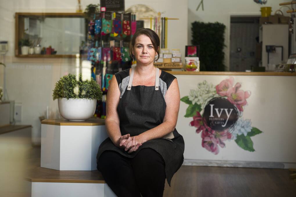 Owner of Ivy Flowers and Gifts, Renee Coleman, is scared for the future of her business if the development doesn't go ahead soon. Photo: Dion Georgopoulos