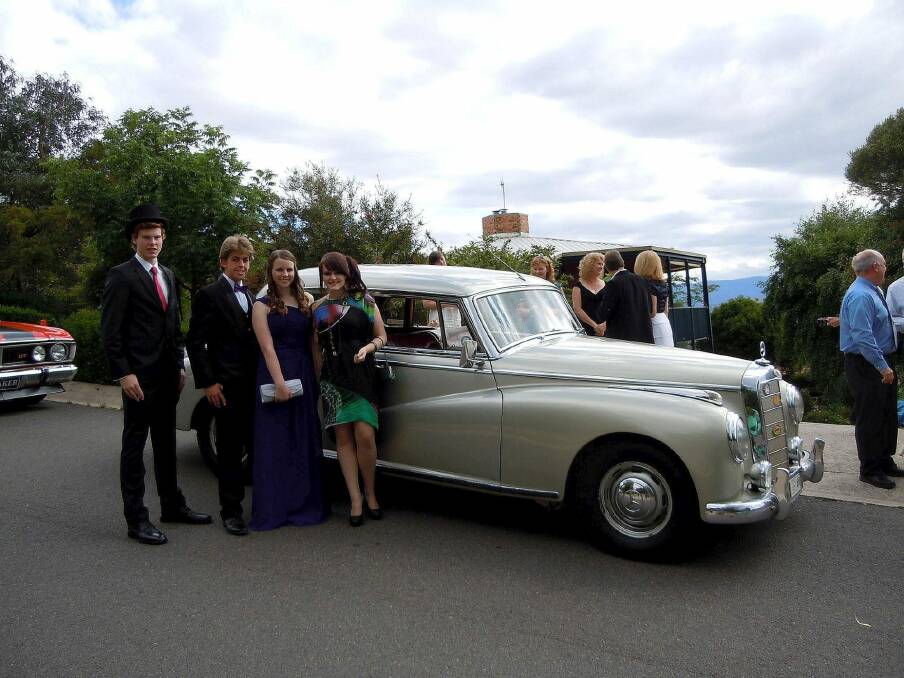 Kate Green, in the purple dress, and her friends stole the show at their school formal when they turned up in the family's Mercedes Benz 300b in 2011.

John Green Mercedes.jpg