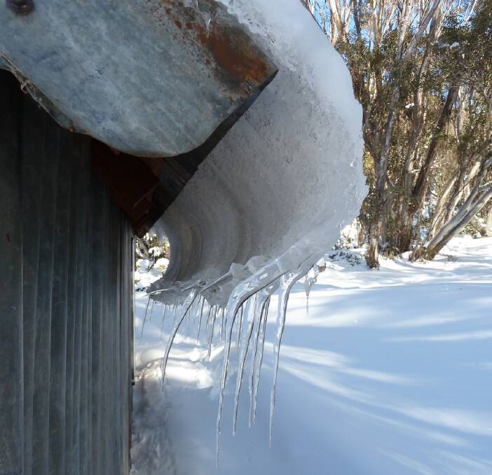 Icicles on the tin roof of Horse Camp Hut. Photo: Matthew Higgins