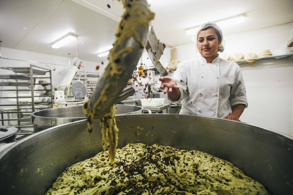 Flute Bakery was preparing huge amounts of raisin-studded dough on Wednesday to get ready for the ovens. Photo: Rohan Thomson