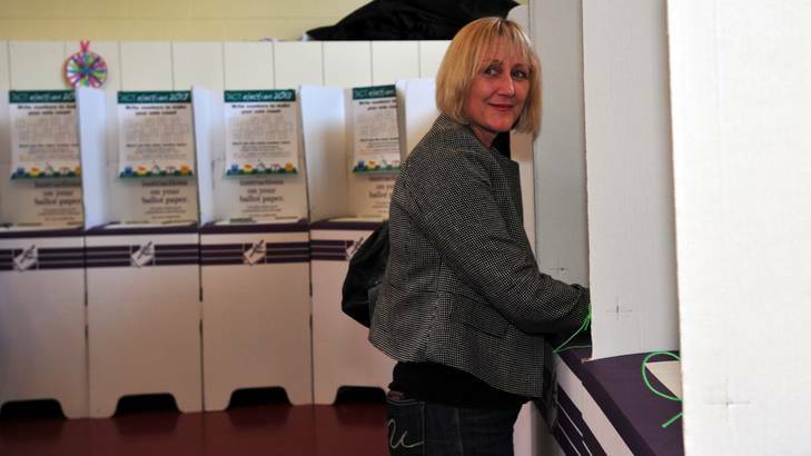 Leader of the ACT Greens Meredith Hunter casts her vote  at Aranda Primary school. Photo: Karleen Minney