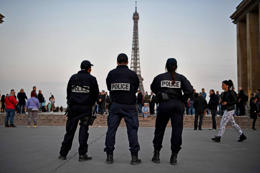 Police secure the centre of Paris the day after a gunman opened fire on officers. Photo: Aurelien Meunier