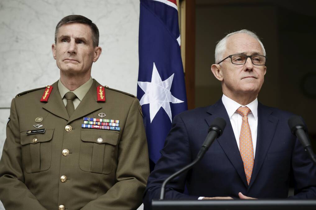 Prime Minister Malcolm Turnbull announces Lieutenant General Angus Campbell as the new Chief of Defence Forces. Photo: Alex Ellinghausen